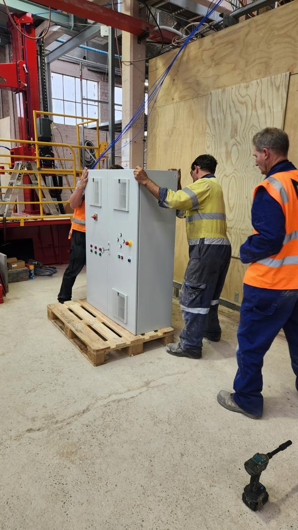 Delicate work to get the control box onto the wall